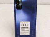 a close up of the back of a blue samsung note 20