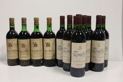 six bottles of wine are lined up on a white surface