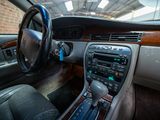 a car dashboard with a steering wheel and a dash board