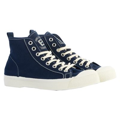 a close up of a pair of blue sneakers on a white background