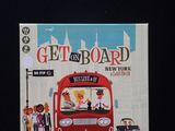 a toy bus that is sitting on top of a box