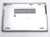 a close up of a laptop with a blue sticker on it