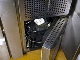 stainless steel counter top in a commercial kitchen with yellow flooring