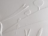 a close up of a hand print on a wall
