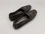 pair of men ' s shoes on a white surface