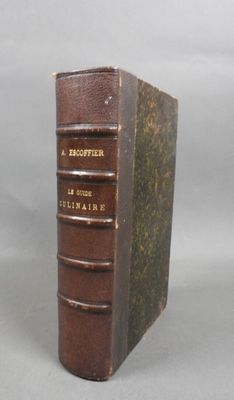 a brown book that is sitting on a table