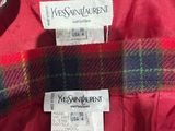 a close up of a red jacket with a label on it