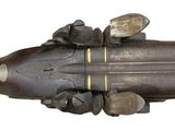 an old gun with a wooden handle on a white background