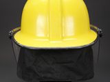 a yellow hard hat sitting on top of a black table