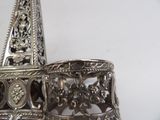a silver object that is sitting on a table
