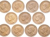 a close up of a bunch of coins with different faces