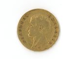 an image of a gold coin with a portrait of a man on it