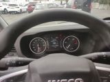 dashboard view of a car with a steering wheel and dashboard gauges