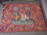 a rug with a picture of a woman and a dog on it