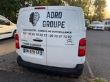 a white van that is parked in a parking lot