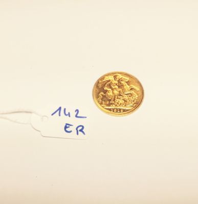 a small piece of paper that has a gold coin on it