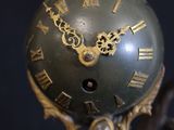 a clock that is sitting on top of a table