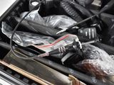 a suitcase full of assorted items that are in it