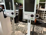 two monitors that are sitting on top of each other