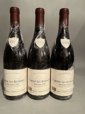 three bottles of wine sitting on top of a table next to each other