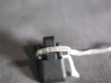 a ring that is sitting on top of a piece of cloth