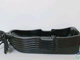 a picture of a black dish with a dragon on it