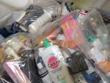 many different types of toothbrushes and other items in the bag