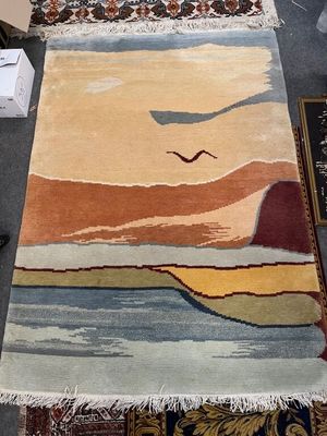 Tapis en laine à décor d'un paysage
