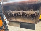 a close up of a machine that has a bunch of wires attached to it