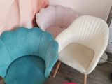 three chairs that are next to each other in a room