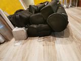 a pile of luggage sitting on the floor in a room