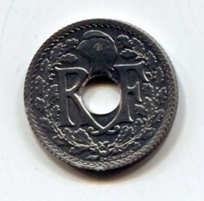 a silver coin with a picture of an elephant on it