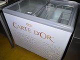 a cart that has some food inside of it