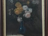 a painting of flowers in a blue vase on a table