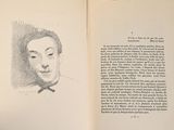 an open book with a drawing of a man ' s face on it