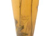 a vase that has a picture of a flower on it