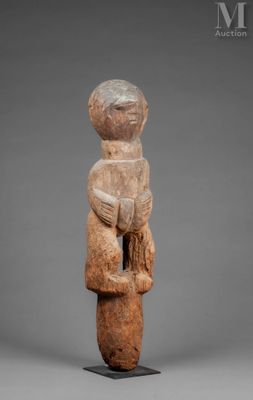 a statue of a woman holding a baby in her arms