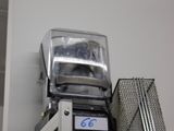 a blender sitting on top of a shelf in a kitchen