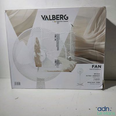 the box is open on a white surface with a picture of a fan in it