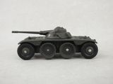 a toy tank that is sitting on a white surface