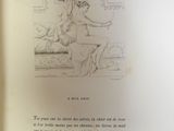 a book with a drawing of a woman sitting on a couch