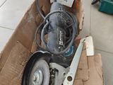 a box that has some tools in it on the floor