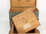 a wooden box that has a box inside of it