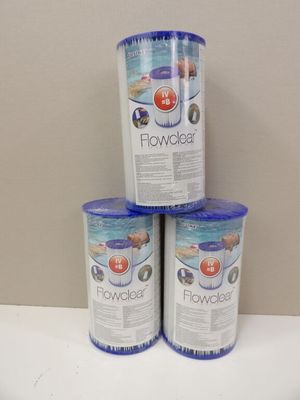three buckets of water sitting on top of a white counter