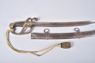 two swords that are on display on a white surface