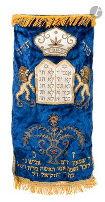 a close up of a blue and gold banner with a crown on it