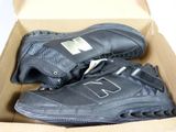 a box with a pair of new balance shoes in it