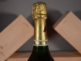 a bottle of wine that is sitting on a table