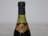 a bottle of wine that is sitting on a table