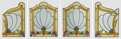 quatre vitraux ornés de fleurs et de feuilles